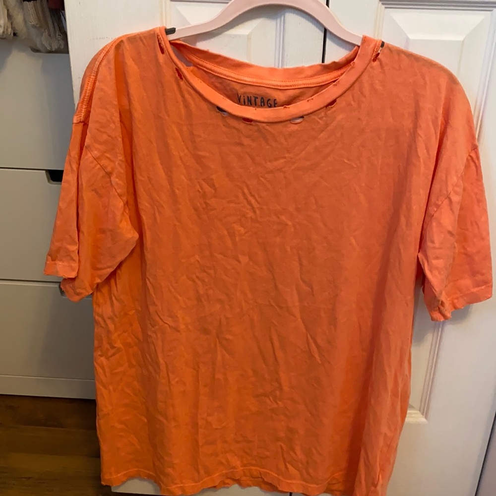Vintage Canvas orange shirt with distressed neck line. size S
